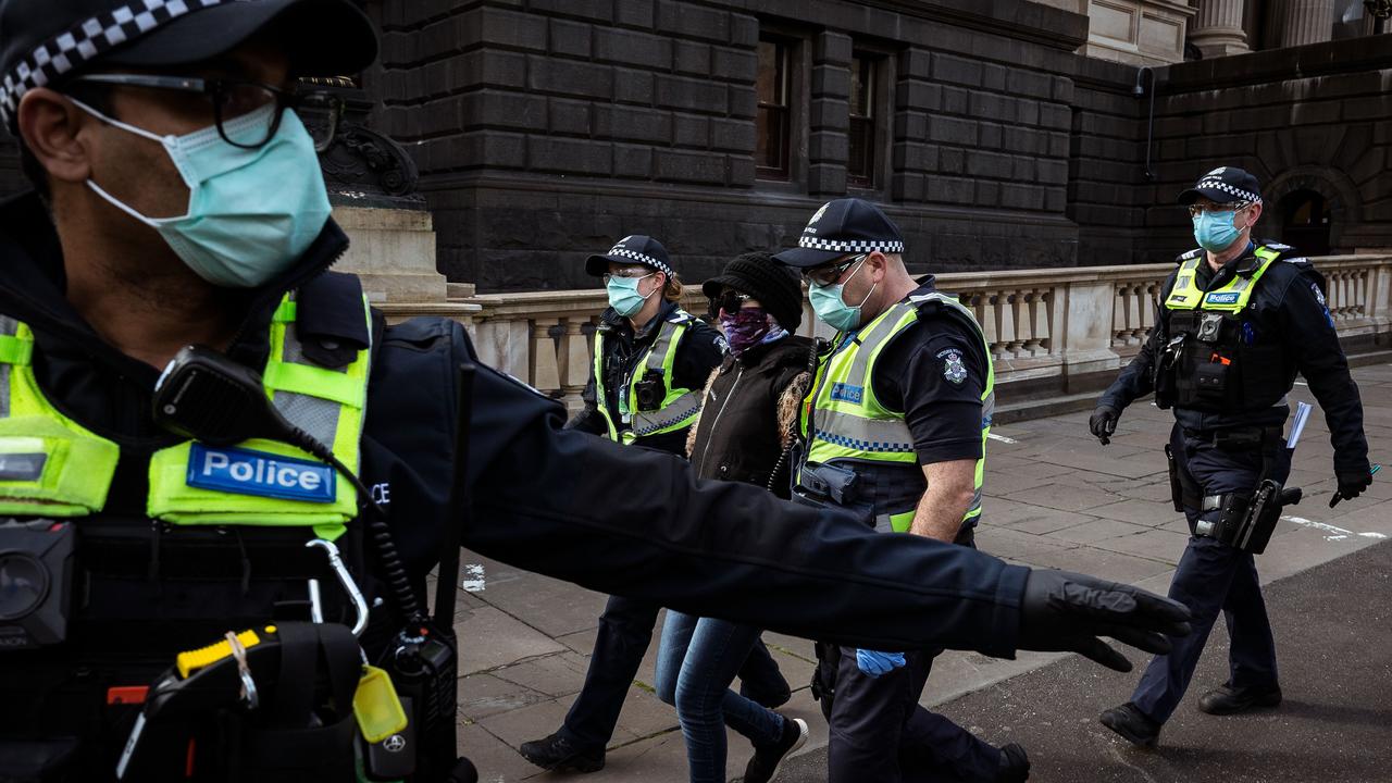 Metropolitan Melbourne is under stage 4 lockdown restrictions. Police seen patrolling the area during a protest against the coronavirus lockdown in Melbourne’s CBD on August 9. Picture: Darrian Traynor/Getty Images