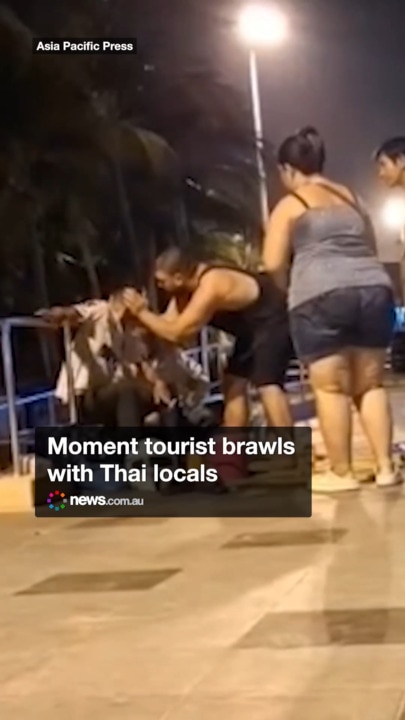 Moment tourist brawls with Thai locals