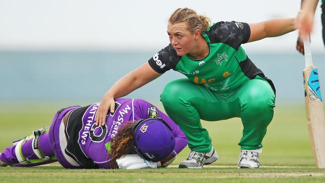 Hayley Matthews lies on th eground after injuring her knee in the match against the Melbourne Stars at West Park on Sunday. Picture: Getty