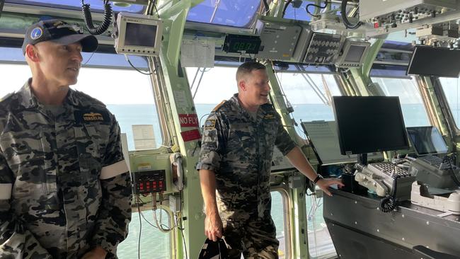 Air Execution Department head Lieutenant Commander Andrew Vergelius and Commanding Officer captain Troy Duggan. Picture: Bethany Griffiths