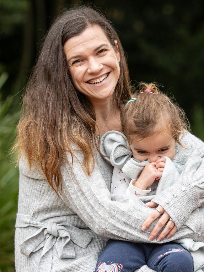 Monika Peebles with daughter Josie, who is missing her dad.