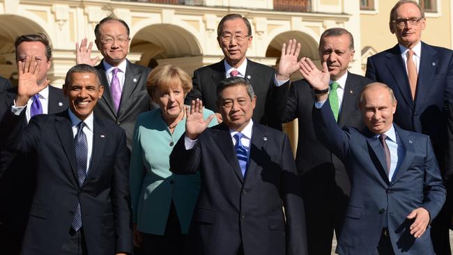 Carr, top right, pictured with world leaders back in 2013.