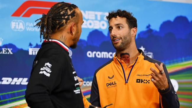 Lewis Hamilton of Great Britain and Mercedes and Daniel Ricciardo