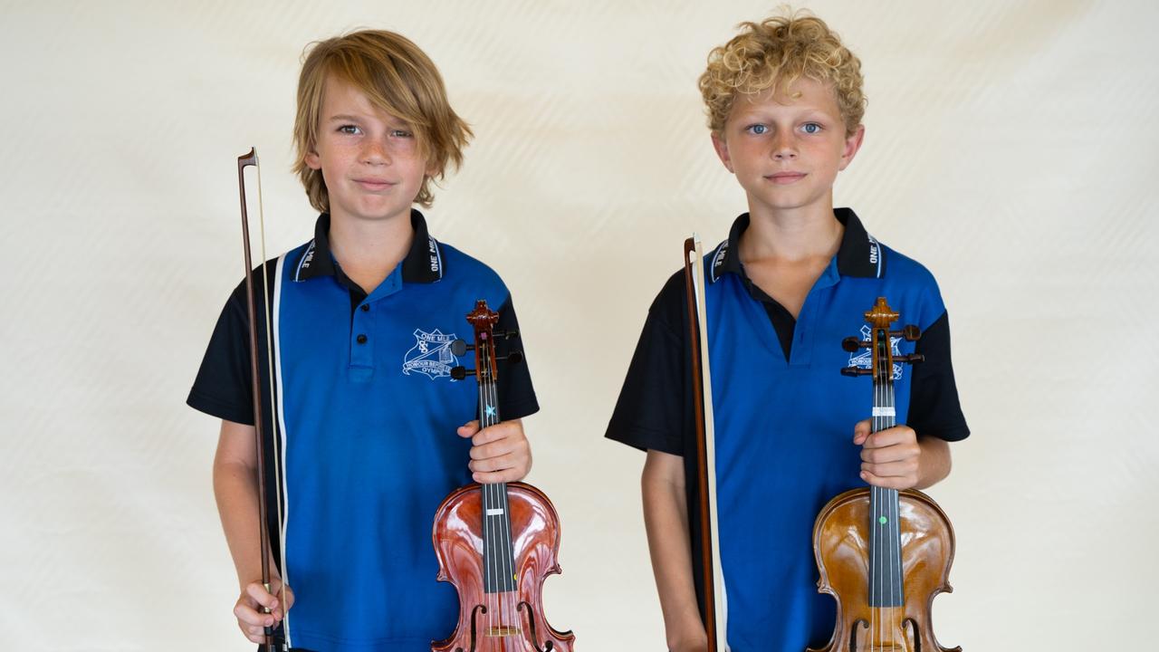 James Bryant and Alex Schuetze from One Mile State School prepare for the small instrumental ensemble strings (primary school) at the Gympie Eisteddfod. August 1, 2023. Picture: Christine Schindler