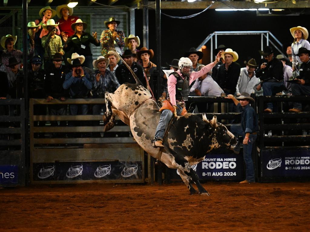 Giru cowboy Braydon Wellby in action to win the Open Bull Ride final event at the Mount Isa Mines Rodeo on Saturday. Picture: Dan Peled/Getty Images