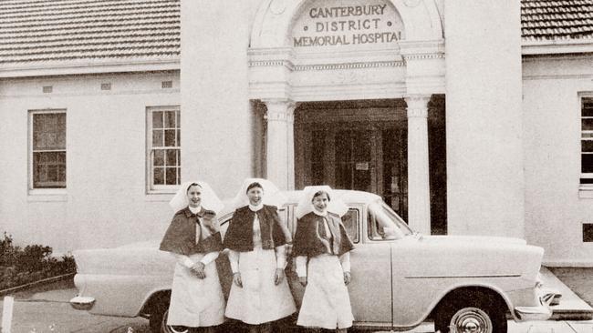 Three nurses outside the hospital entrance in the 1930s. Picture: Sydney Local Health District