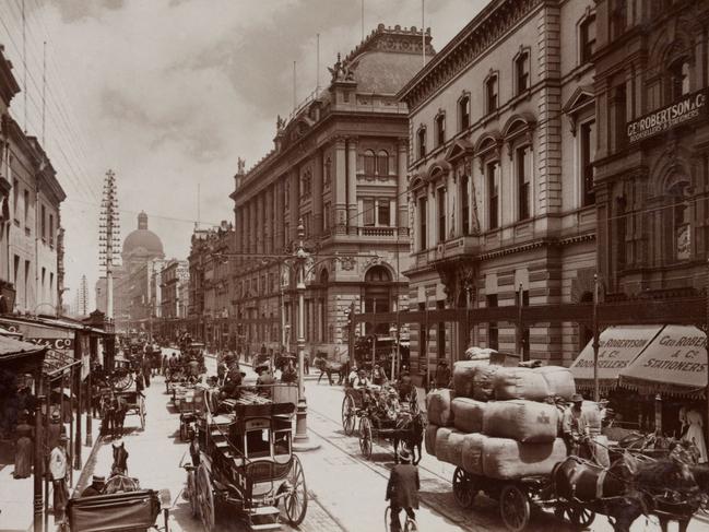 Heavy vehicle traffic in George Street, Sydney in 1900 photograph by photographer Willem van der Velden, part of Sydney Exposed exhibition at State Library of NSW.