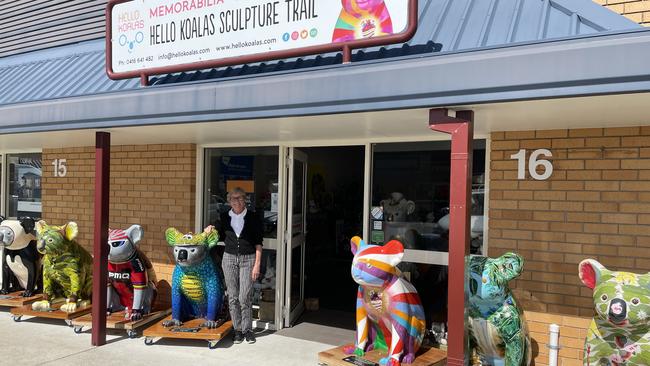 Hello Koalas Sculpture Project Director Margret Meagher standing outside the Bellbowrie St shopfront.