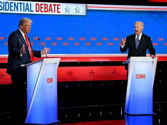 TOPSHOT - US President Joe Biden and former US President and Republican presidential candidate Donald Trump participate in the first presidential debate of the 2024 elections at CNN's studios in Atlanta, Georgia, on June 27, 2024. (Photo by ANDREW CABALLERO-REYNOLDS / AFP)