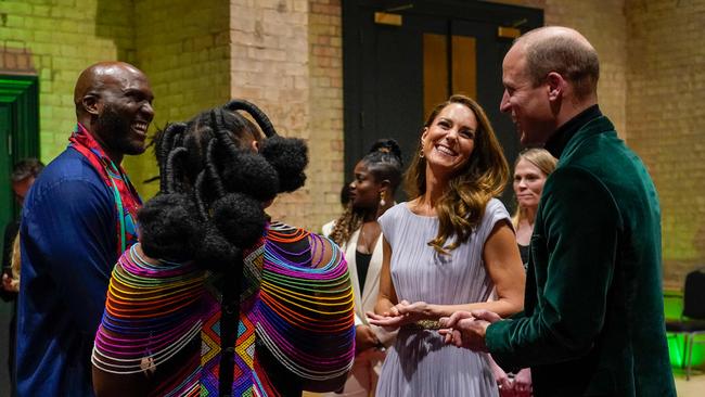 The couple talking with guests at the Earthshot Prize Awards. Picture: Alberto Pezzali / POOL / AFP.