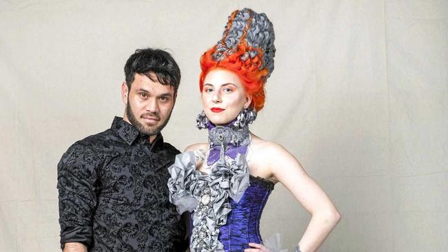 Pirekopa Taylor with his winning design worn by model model Rebecca Madigan.