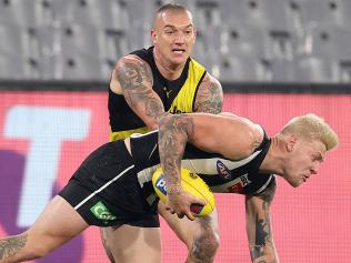 Footy’s flat return in sapping Pies, Tigers draw