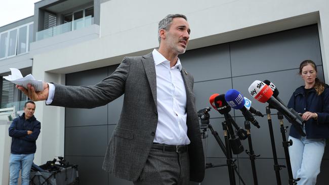 Alex Ryvchin speaks to the media outside his former home. Picture: Max Mason-Hubers