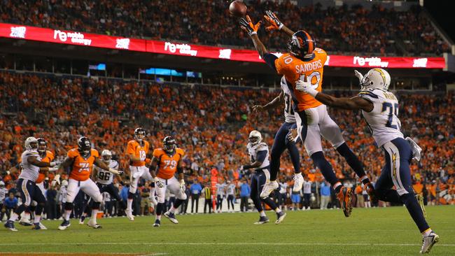 Wide receiver Emmanuel Sanders #10 of the Denver Broncos has his third touchdown catch of the game.