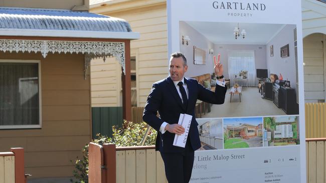 Gartland Property agent Nathan Ashton auctions a property in Little Malop St, Geelong. Picture: Peter Ristevski