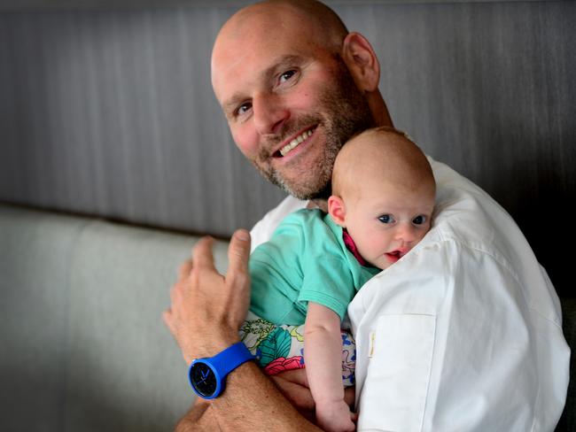 Pavoni with his daughter Jada in 2014, when she was only seven weeks old. photo Jeremy Piper