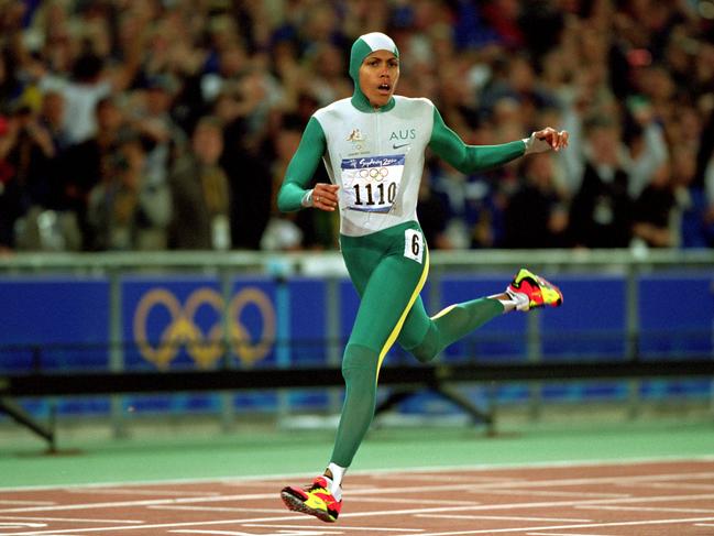 Cathy Freeman crosses the line to win gold in the Womens 400m Final at the Sydney 2000 Olympic Games. Picture: Mike Powell /Allsport