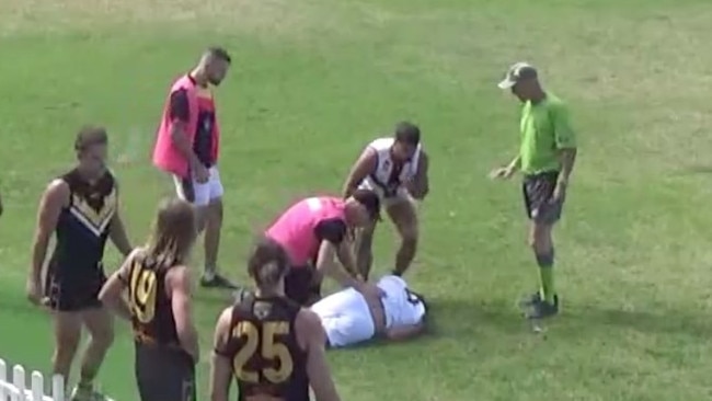 Kyle Kirk receives attention after being knocked out momentarily by a sling tackle against Brighton. Picture: Dartfish TV