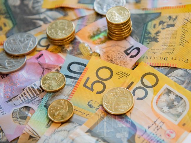 Australian notes and coins spilled out on a table  Picture: istock