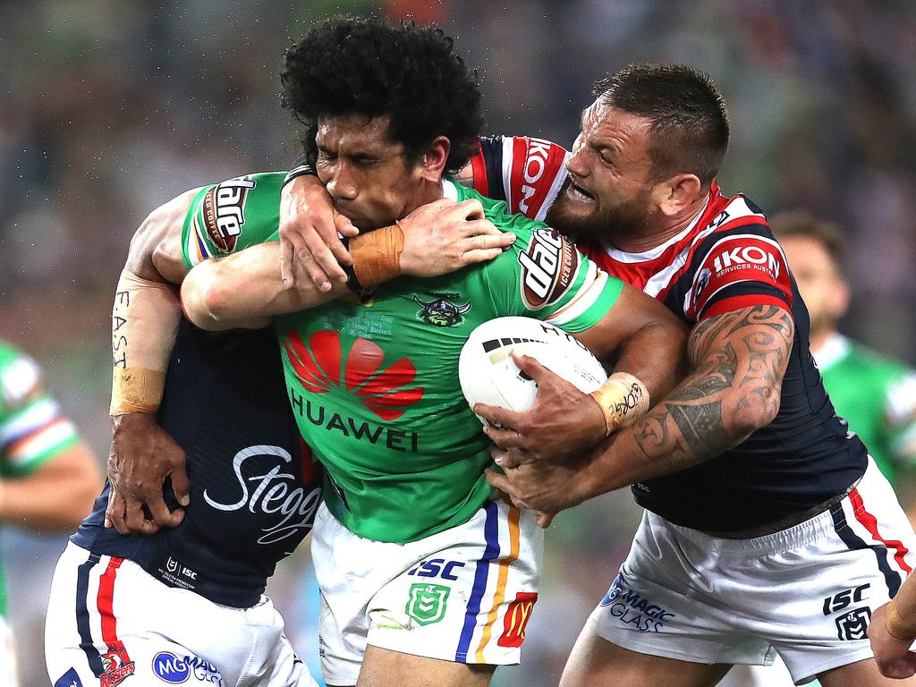 Canberra's Iosia Soliola tackled by Roosters' Jared Waerea-Hargreaves during the 2019 NRL Grand Final between the Sydney Roosters and Canberra Raiders at ANZ Stadium on 6 October, 2019 in Sydney. Picture. Phil Hillyard