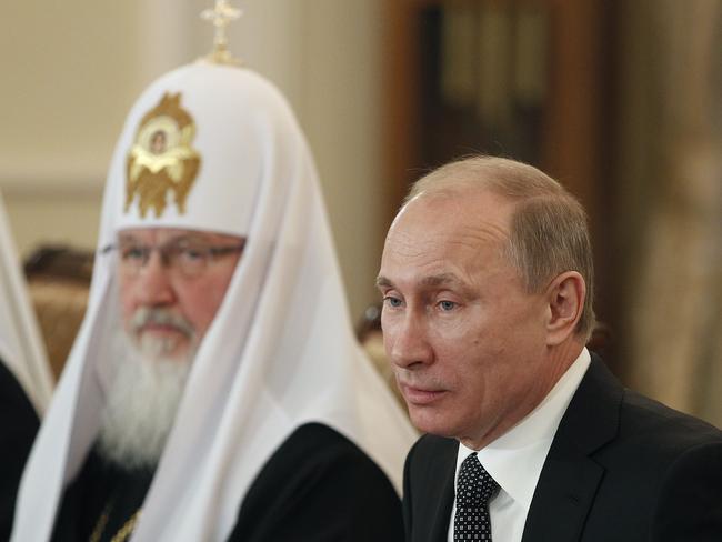 Patriarch Kirill with Vladimir Putin.