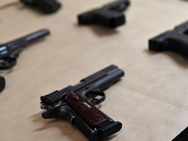 Gun arsenal found underneath man’s bed