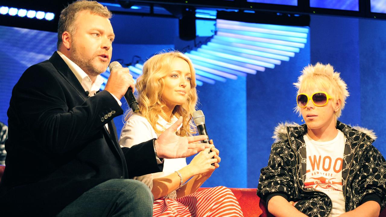 Party boy Corey Worthington, seated with Channel 10 (10) Big Brother hosts Kyle Sandilands (L) and Jackie O during the broadcast of the 'Gatecrashes' episode at Dreamworld on Queensland's Gold Coast.