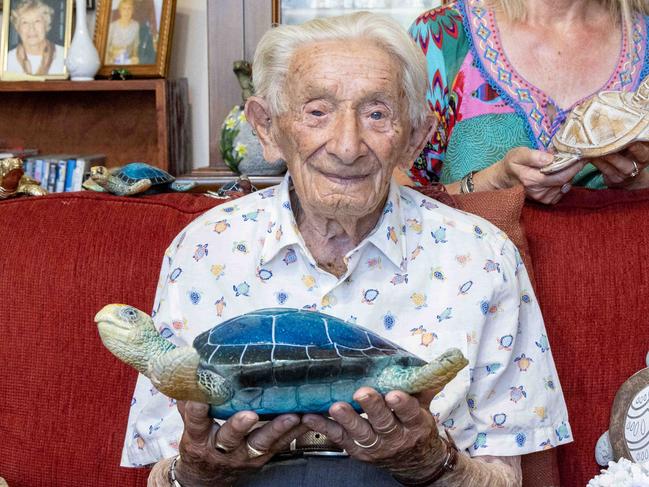 January 2, 2025: Jack Turner, 101, with friend Jan, is an ardent collector of turtles with just some of the 300 turtles he has collected.  Picture: Kelly Barnes