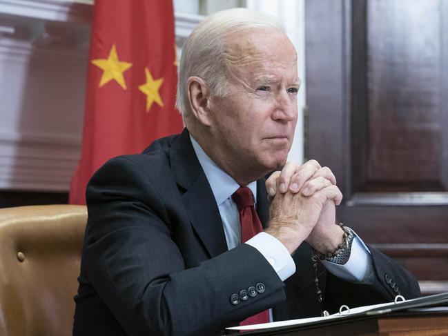 U.S. President Joe Biden listens while meeting virtually with Xi Jinping, China's president, in the Roosevelt Room of the White House in Washington, D.C., U.S., on Monday, Nov. 15, 2021. With trade, Taiwan and China's economic practices on the agenda, the U.S. is hoping to put "guardrails" on the relationship so things don't worsen. Photographer: Sarah Silbiger/UPI/Bloomberg via Getty Images