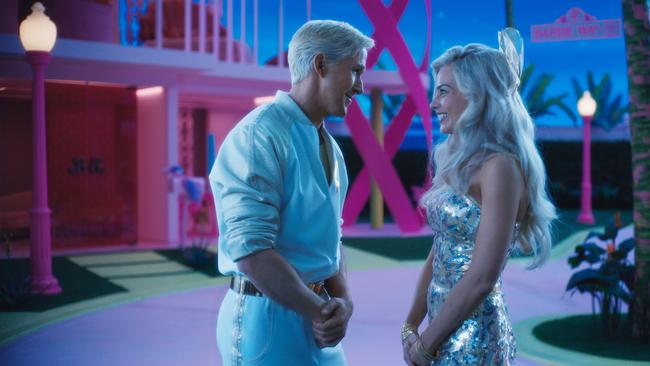 Ryan Gosling as Ken and Margot Robbie as Barbie in a scene from the movie Barbie.