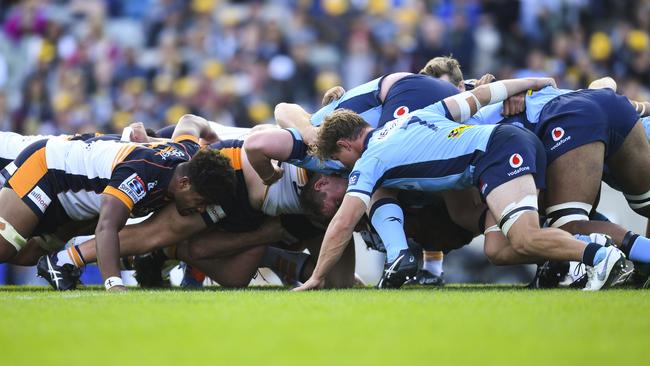 Brumbies and Waratahs players pack a scrum on Sunday afternoon in the last Super Rugby match before the competition goes into suspension. Picture: AAP