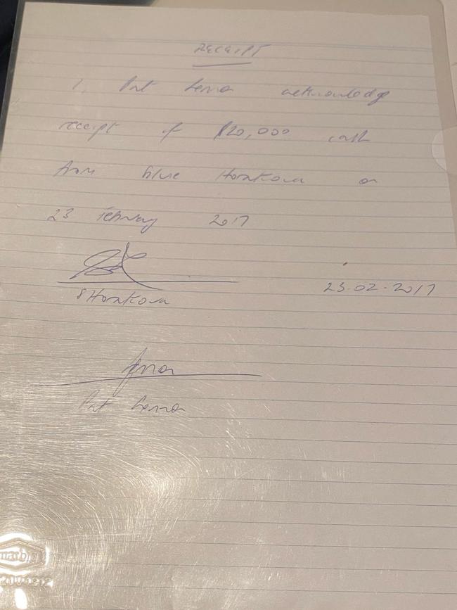 In dispute … A handwritten receipt for $20,000 received from Silvie Horakova that she claims was signed by former lawyer Pat Lennon, dated February 23, 2017. Source: Supplied.