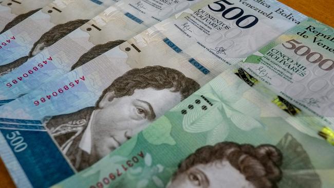 New 500 and 5000-Bolivar notes are pictured in Caracas on January 16. The South American country has the highest inflation rate in the world. Picture: Juan Barreto/AFP