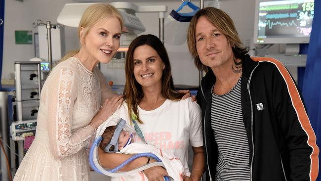 The down-to-earth couple visited a number of sick kids and their parents.