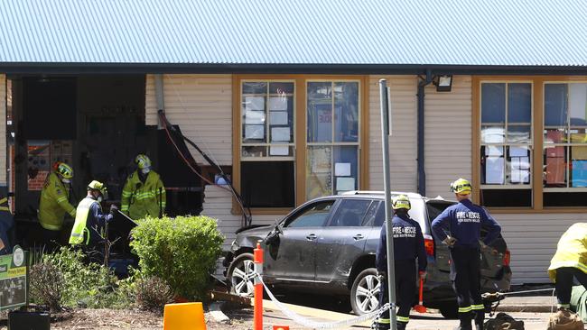 Firefighters and police at the scene in Greenacre. Picture: Hollie Adams / The Australian