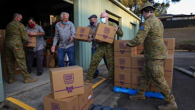 Blacktown RSL Sub-Branch volunteers and members of the RNSWR at the Blacktown Army Reserve Depot with care packages. Picture: Justin Lloyd