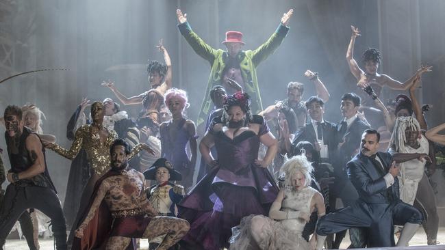 Keala Settle (centre, purple dress) with other circus performers in a scene from Twentieth Century Fox's film The Greatest Showman.