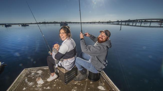 Aaron ‘Red’ Habgood with fiancee Kari Peart and baby boy, Finn. Picture: Rob Leeson