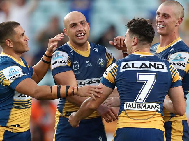 SYDNEY, AUSTRALIA - APRIL 05: Blake Ferguson of the Eels celebrates after scoring a try during the round four NRL match between the Wests Tigers and the Parramatta Eels at Stadium Australia on April 05, 2021, in Sydney, Australia. (Photo by Mark Metcalfe/Getty Images)