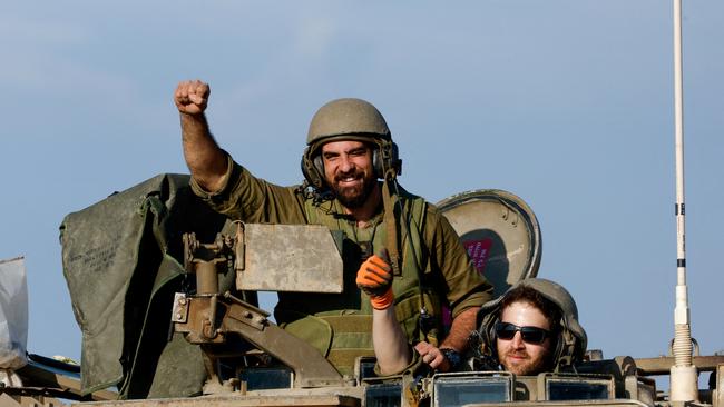 Israeli soldiers troops move out of the Gaza Strip this week. Picture: Reuters