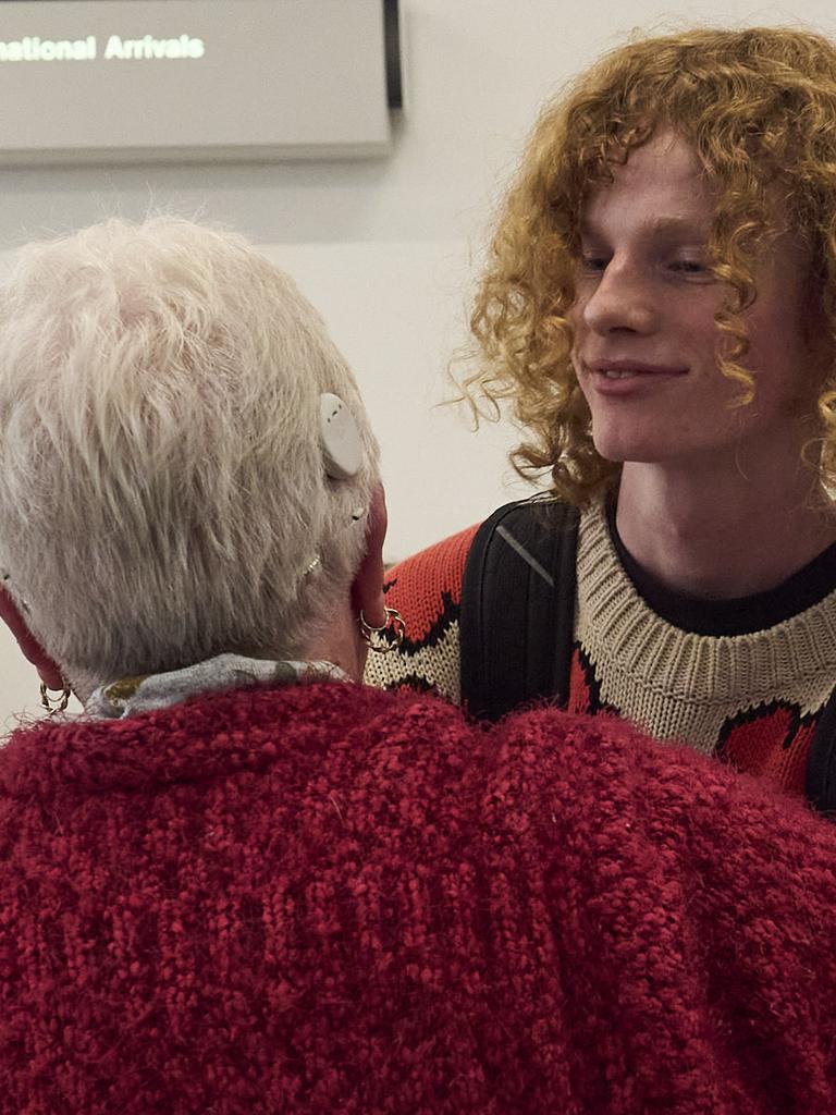 Kane, 16, hugs his grandmother at Adelaide Airport. Picture: Matt Loxton