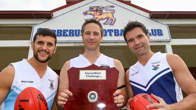 HMAS Cerberus captain Dimitri Garoufalis, with the MFB’s Brock Ferguson and Victoria Police’s Ilya Fridman.