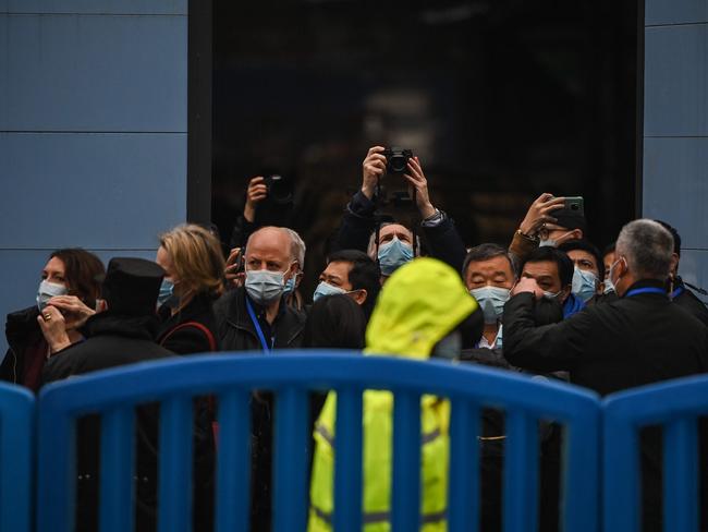 Members of the World Health Organisation (WHO) team, investigating the origins of the Covid-19 coronavirus, visit the closed Huanan Seafood market in Wuhan. Picture: AFP