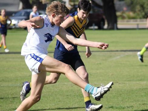 Port Adelaide player Mitch Georgiades playing football as a junior in WA.