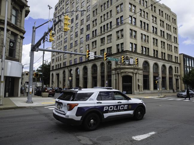 A Scranton Police vehicle drives through downtown ahead of a visit to the area by President Donald J Trump. Picture: Angus Mordant for News Corp Australia