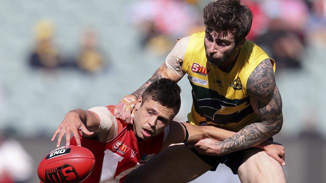 Robbie Young and Jack Firns tangle during the preliminary final. Picture Sarah Reed