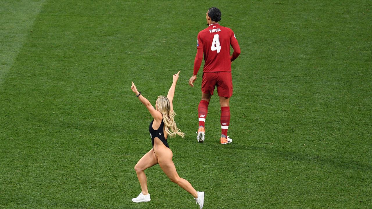 A pitch invader runs onto the pitch during the Champions League Final