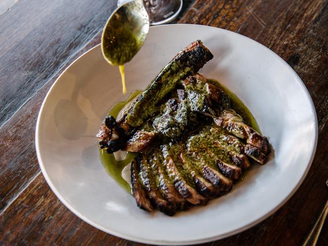 Pork Tomahawk at Nido. Photo: The Advertiser/ Morgan Sette