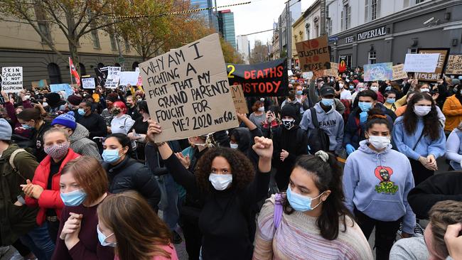 Protesters were urged to wear masks and carry hand sanitiser. Picture: AAP Image/James Ross