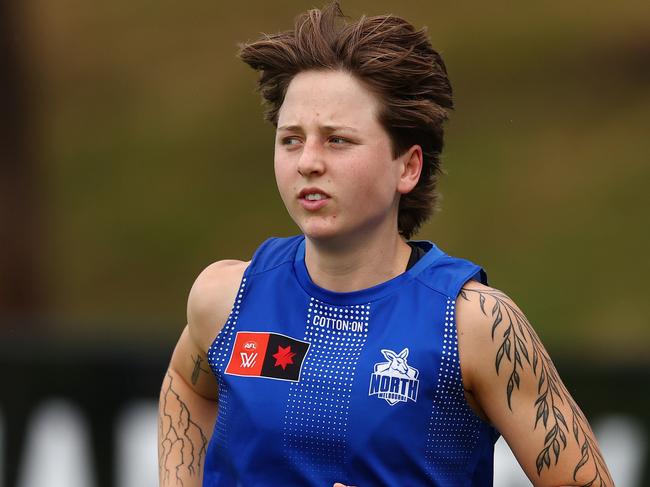 MELBOURNE, AUSTRALIA - NOVEMBER 27: Tess Craven of the Kangaroos trains away from the main group during a North Melbourne Tasmanian Kangaroos Training Session at Arden Street Ground on November 27, 2024 in Melbourne, Australia. (Photo by Morgan Hancock/Getty Images)